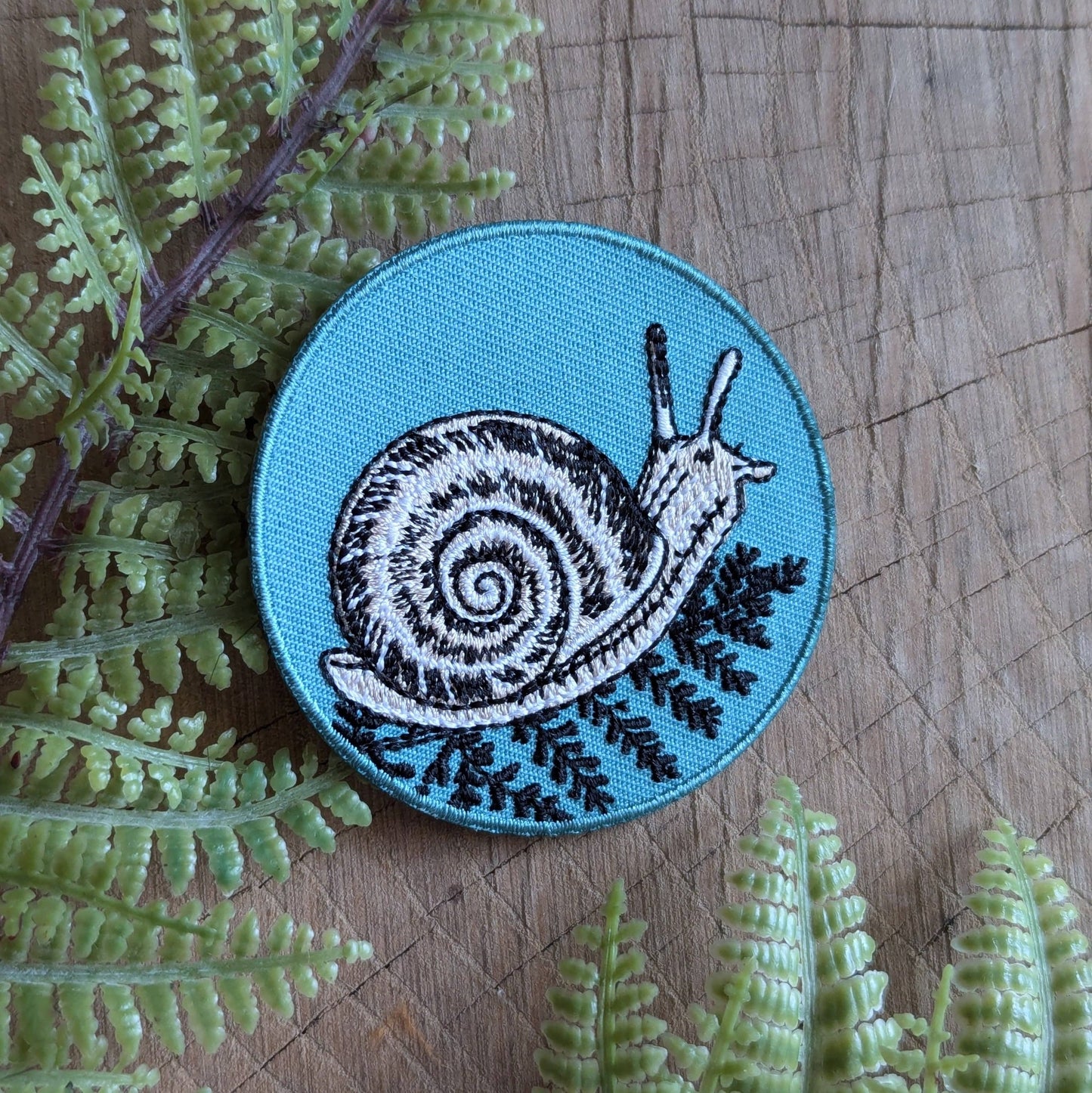 Iron - on patch | snail with fern - 2.5" round teal - homesewn