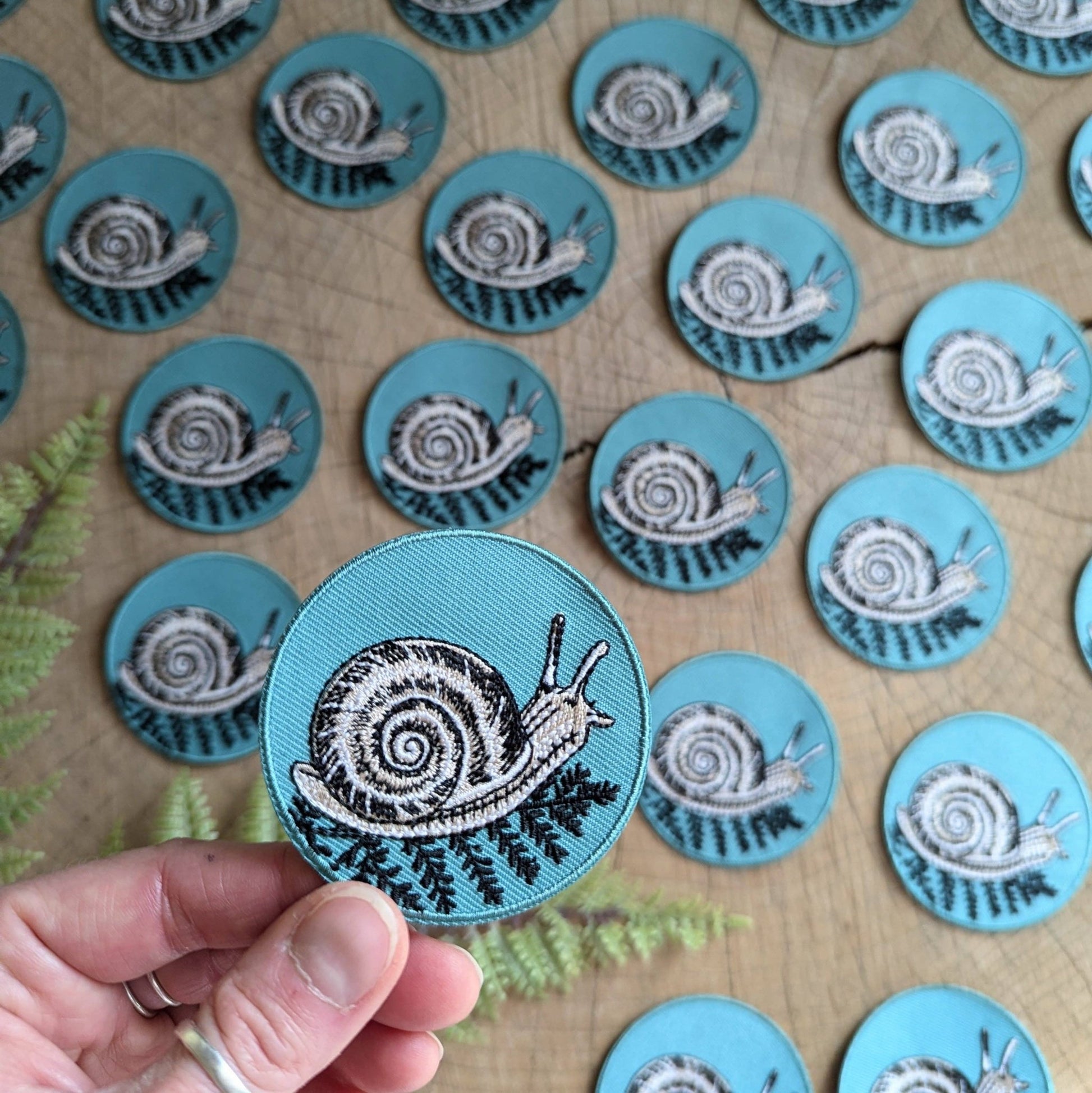 Iron - on patch | snail with fern - 2.5" round teal - homesewn